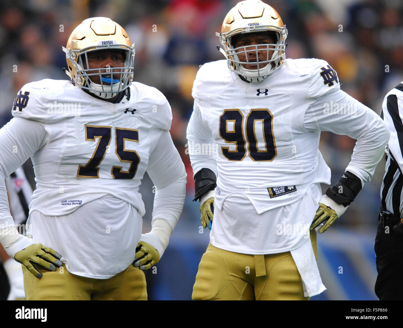 Pittsburgh, PA, USA. 7th Nov, 2015. Mark Harrell #75 and Isaac Rochell ...