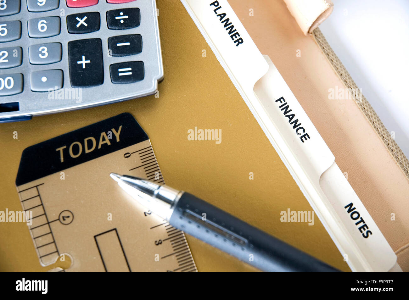 stationery on planner and finance page Stock Photo Alamy