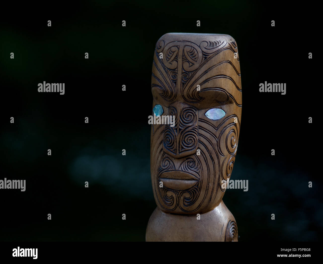 Maori God Warrior Ancestor with tattooed face Stock Photo