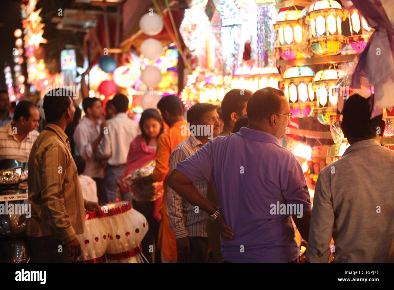 Pune, India - November 7, 2015: People in India shopping for sky lanterns on the occasion of Diwali festival in India Stock Photo