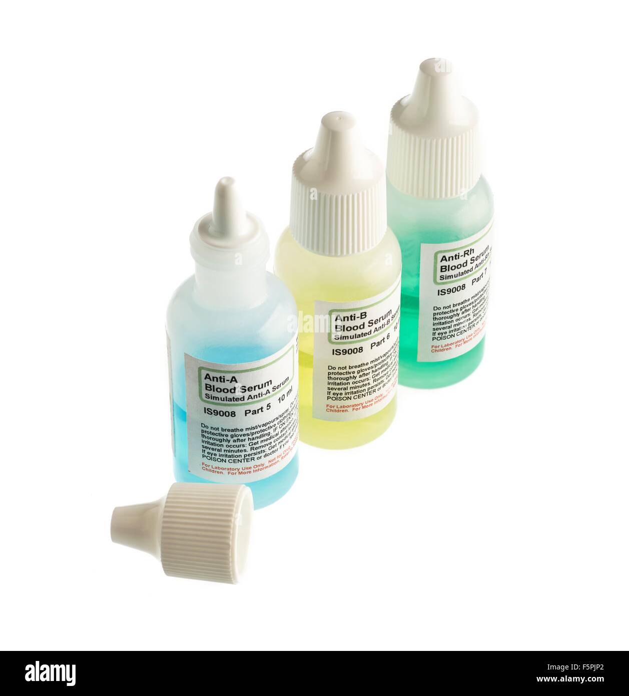 Blood serum samples in plastic bottles against a white background. Stock Photo