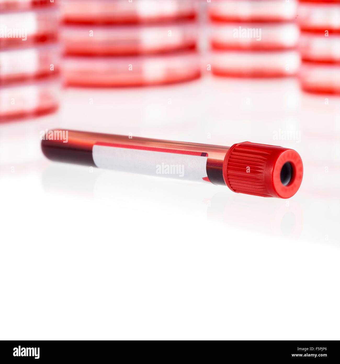 Blood collection tube against a white background. Stock Photo