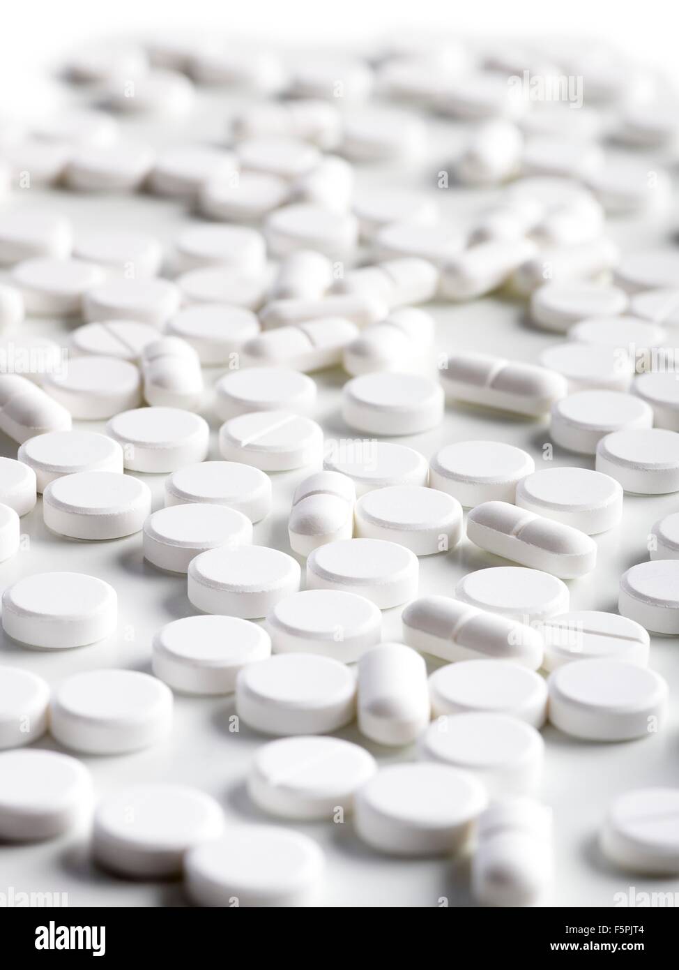 White pills, close up. Stock Photo