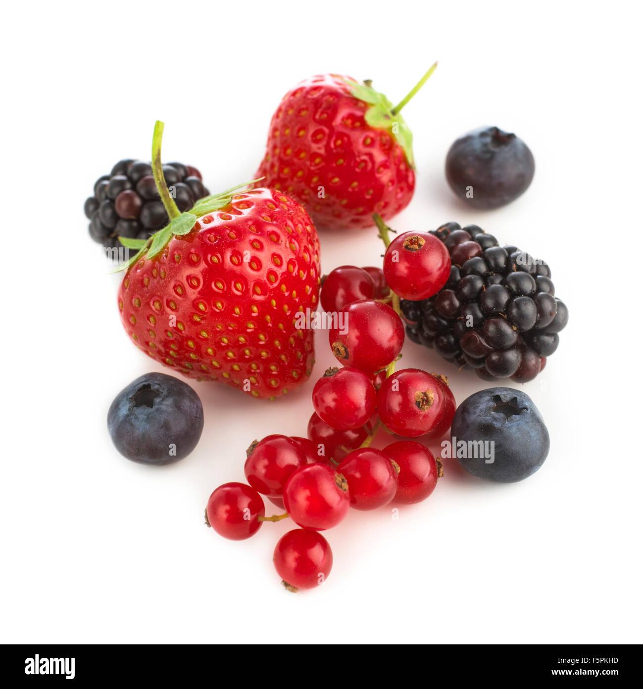 Fresh berry fruits against a white background. Stock Photo