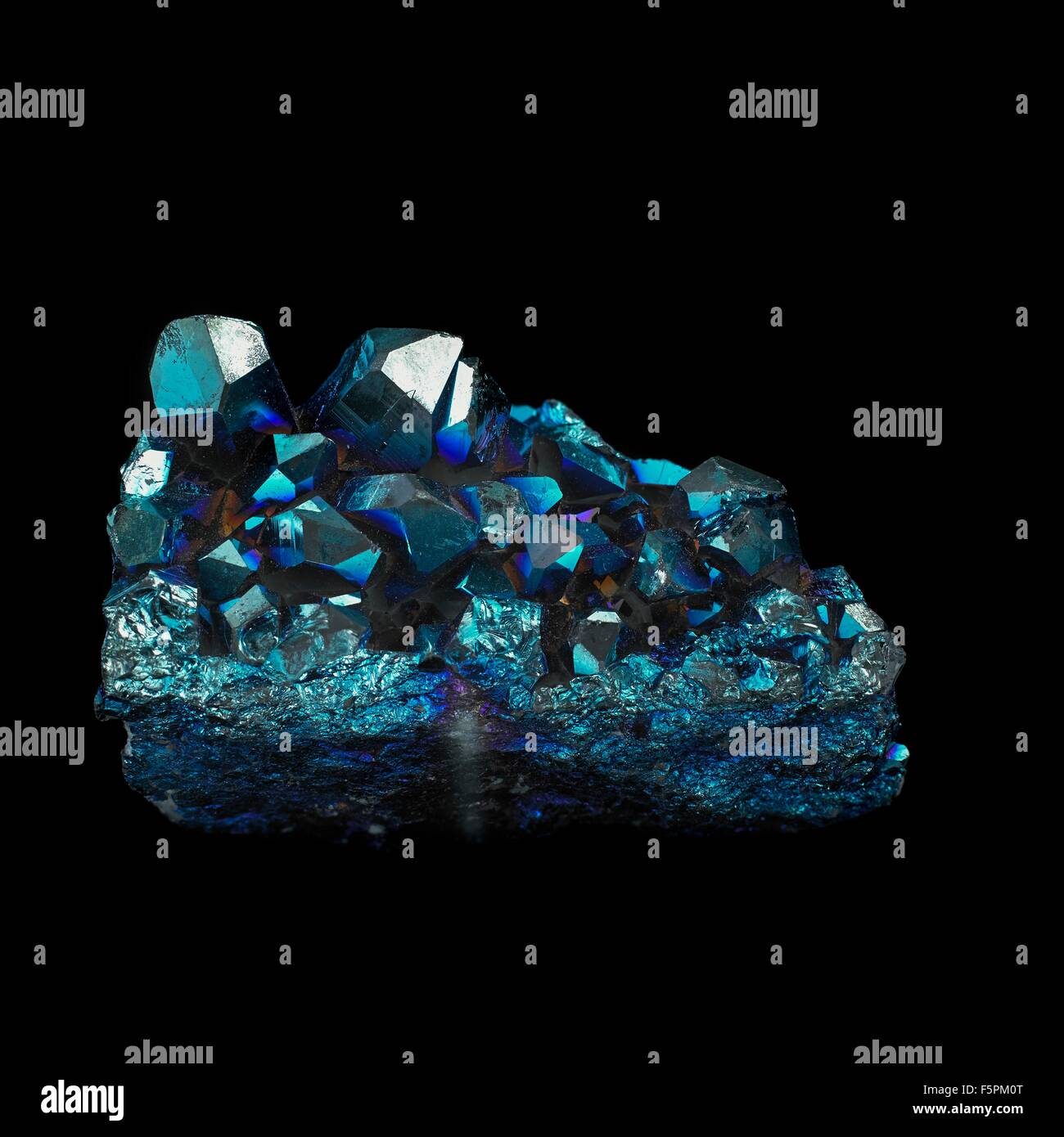 Titanium quartz against a black background. These quartz crystals have