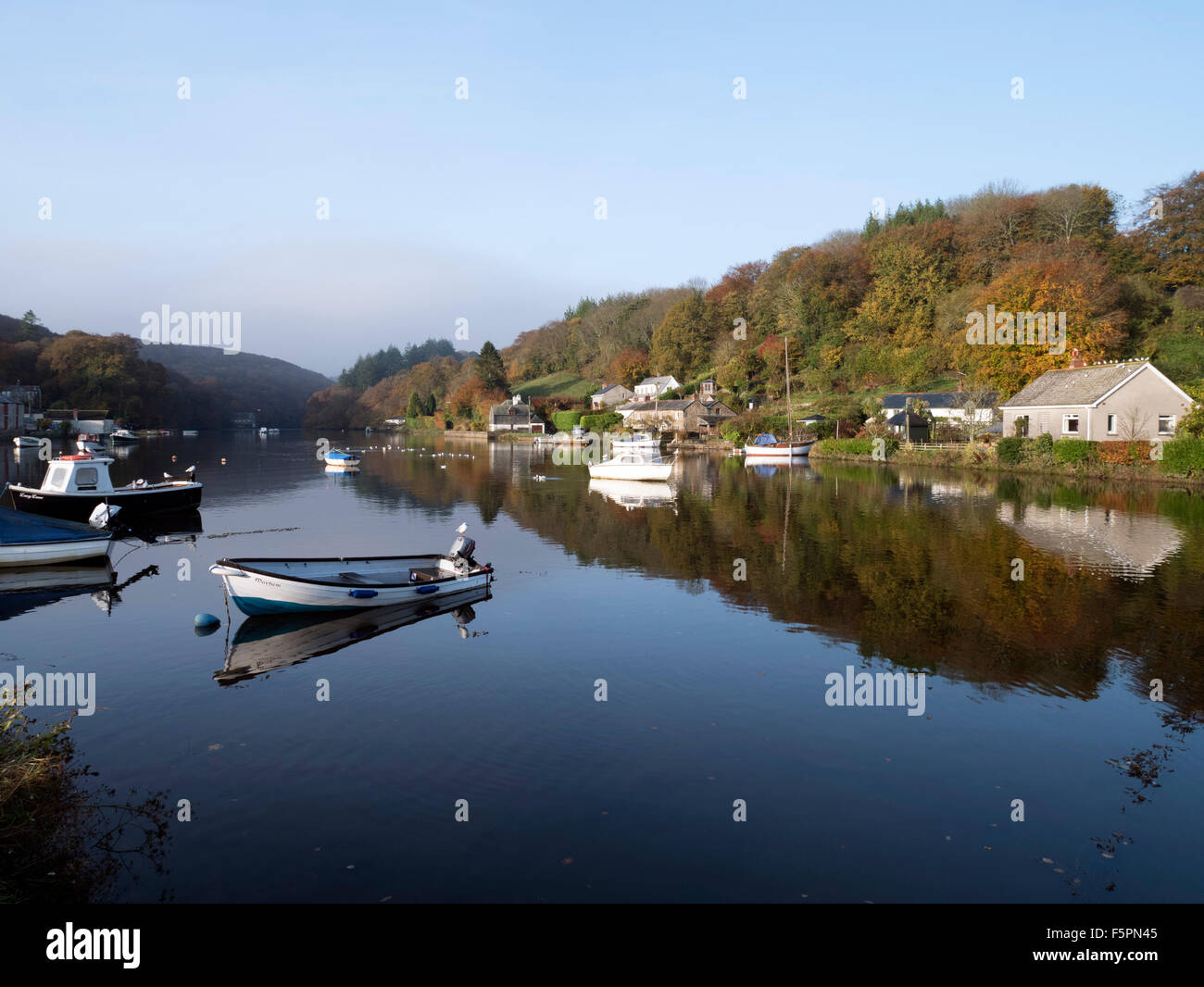 Autumn reflections in the river at Lerryn Cornwall Stock Photo