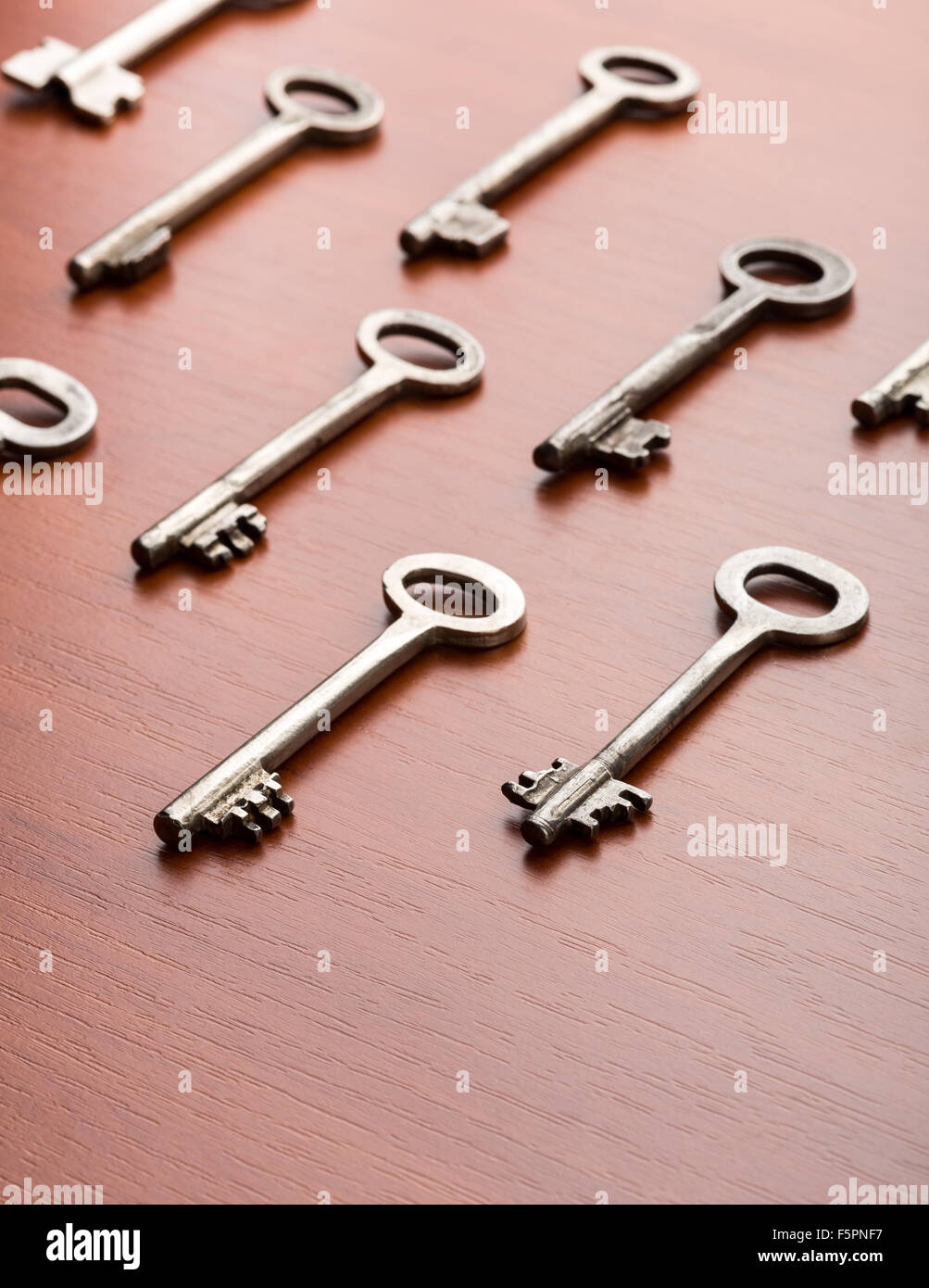 Keys lie on the wooden table Stock Photo - Alamy