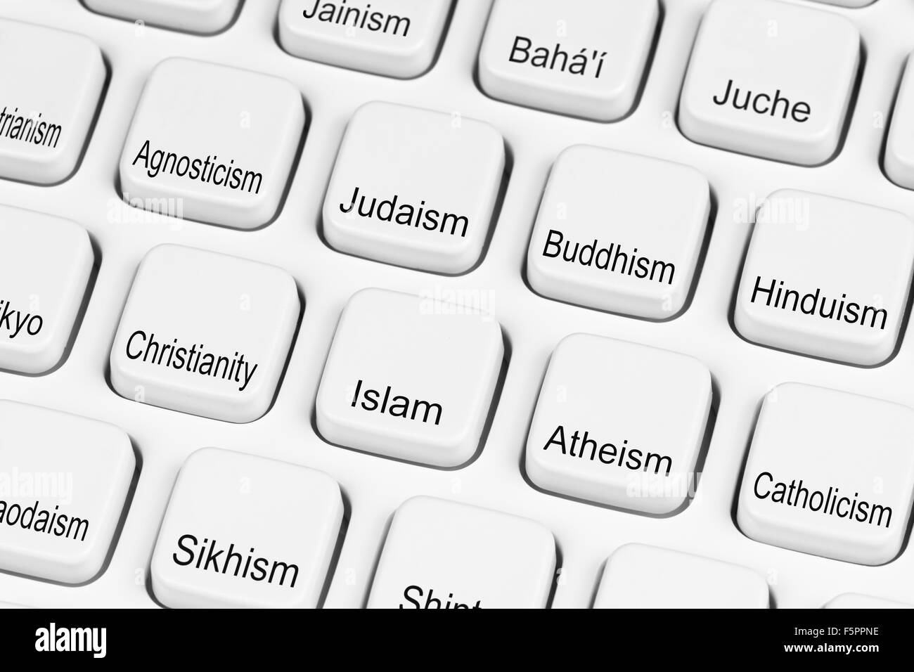 Religion selection buttons on a computer keyboard. Different religions concept. Choice of religions. Religious options concept. Stock Photo