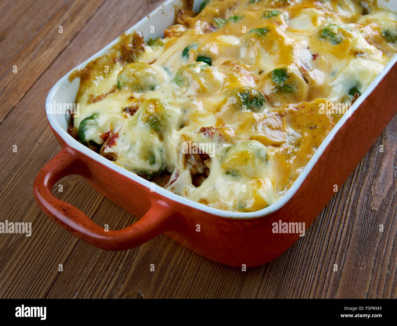Homemade Chicken Divan - chicken casserole served with almonds, and Mornay sauce.  American cuisine Stock Photo