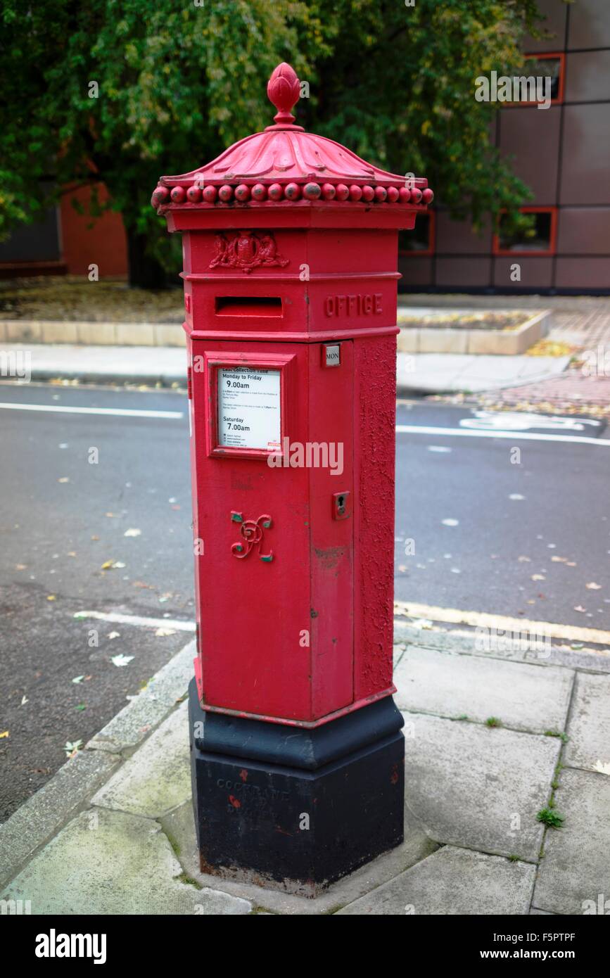 Victorian six sided red Post Office pillar box Stock Photo Alamy