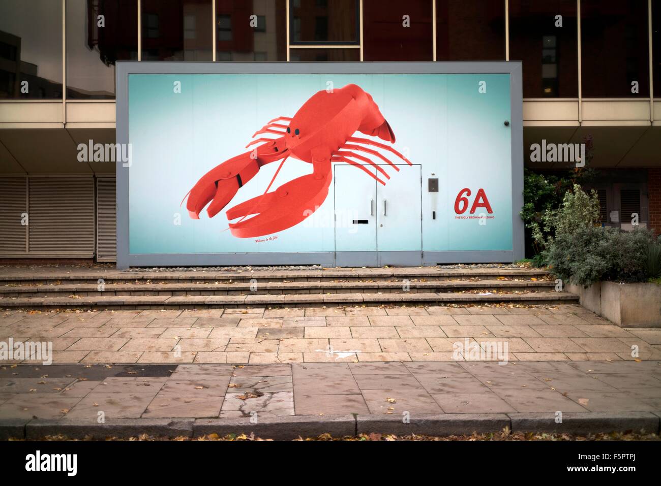 Distinctive Lobster graphic on the entrance to 6A St Pancras Way near