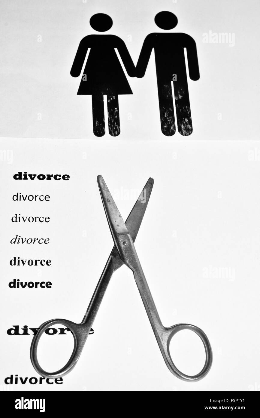The divorce and separation. A symbolic representation of the decay of a pair of men and women. Stock Photo