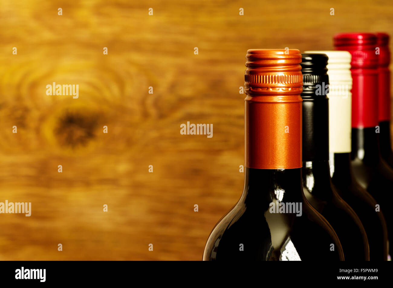 Tops of wine bottles with screw caps for background Stock Photo Alamy