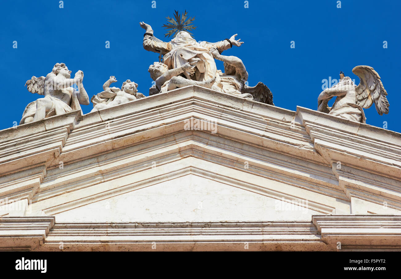 Sculpture group on the roof of Chiesa Di Santa Maria Assunta known as I Gesuiti Cannaregio Venice Veneto Italy Europe Stock Photo