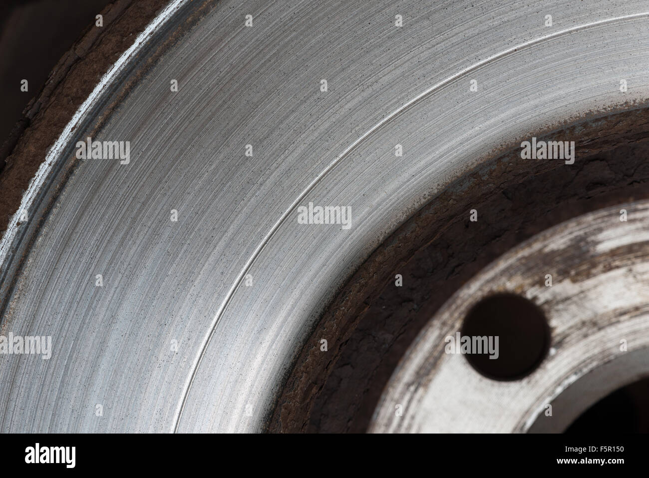 Worn cast steel disc brakes potential accident and brake problems on car can lorry with worn