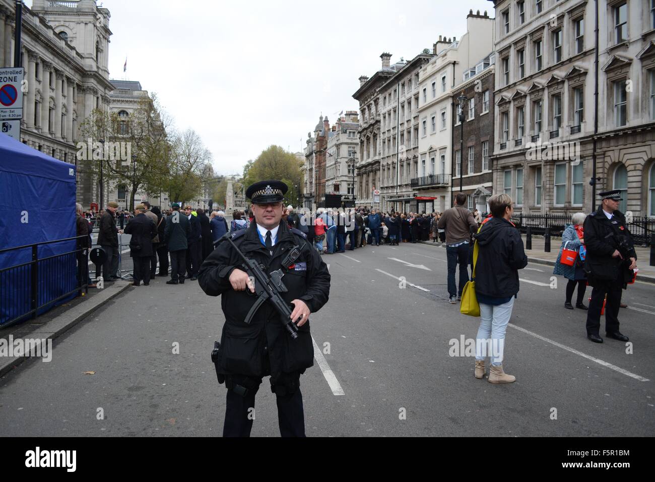 An armed police officer stands hi-res stock photography and images - Alamy