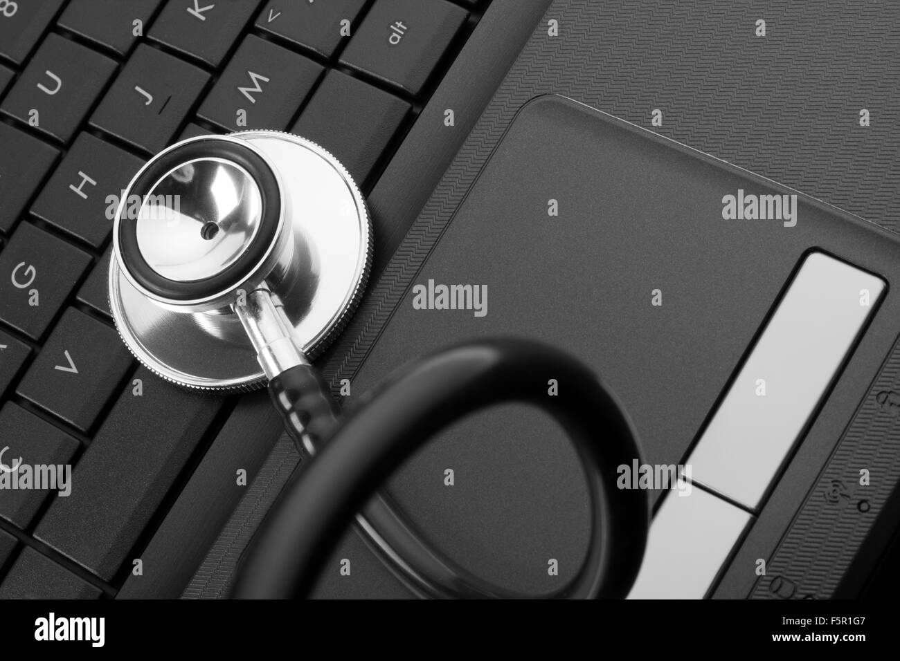 Medical stethoscope on laptop keyboard Stock Photo - Alamy
