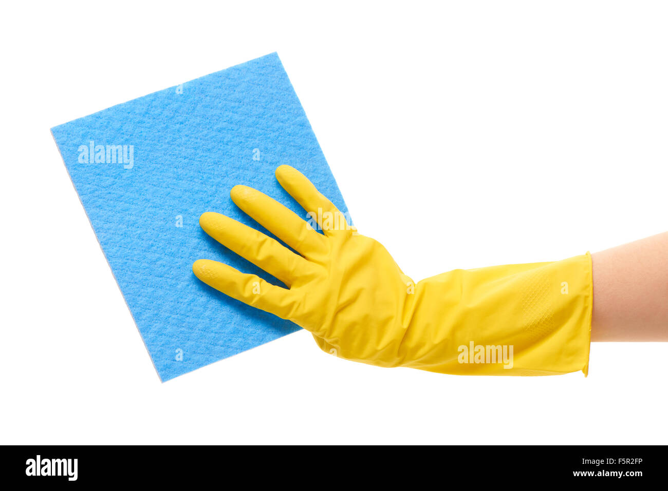 Close up of female hand in yellow protective rubber glove holding blue ...