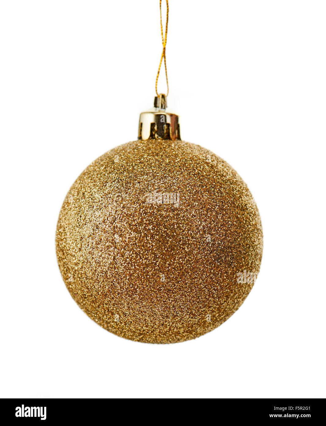 Sparkly christmas ball covered with gold glitter isolated on white background Stock Photo