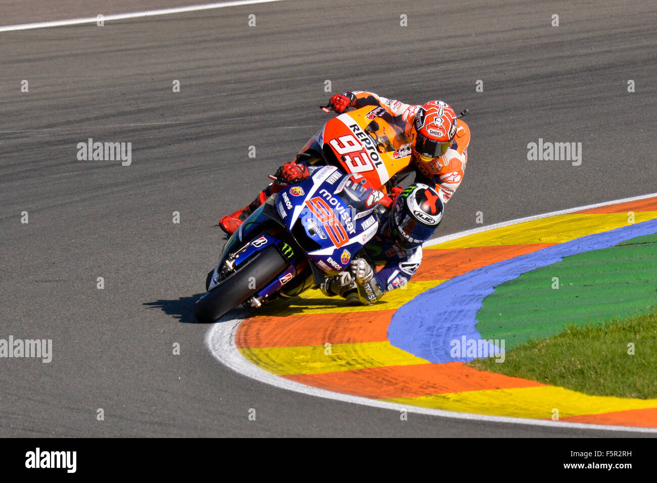 Jorge Lorenzo and Marc Márquez in a bend of the Circuit Ricardo Tormo in Valencia, last race of the 2015 MotoGP Stock Photo