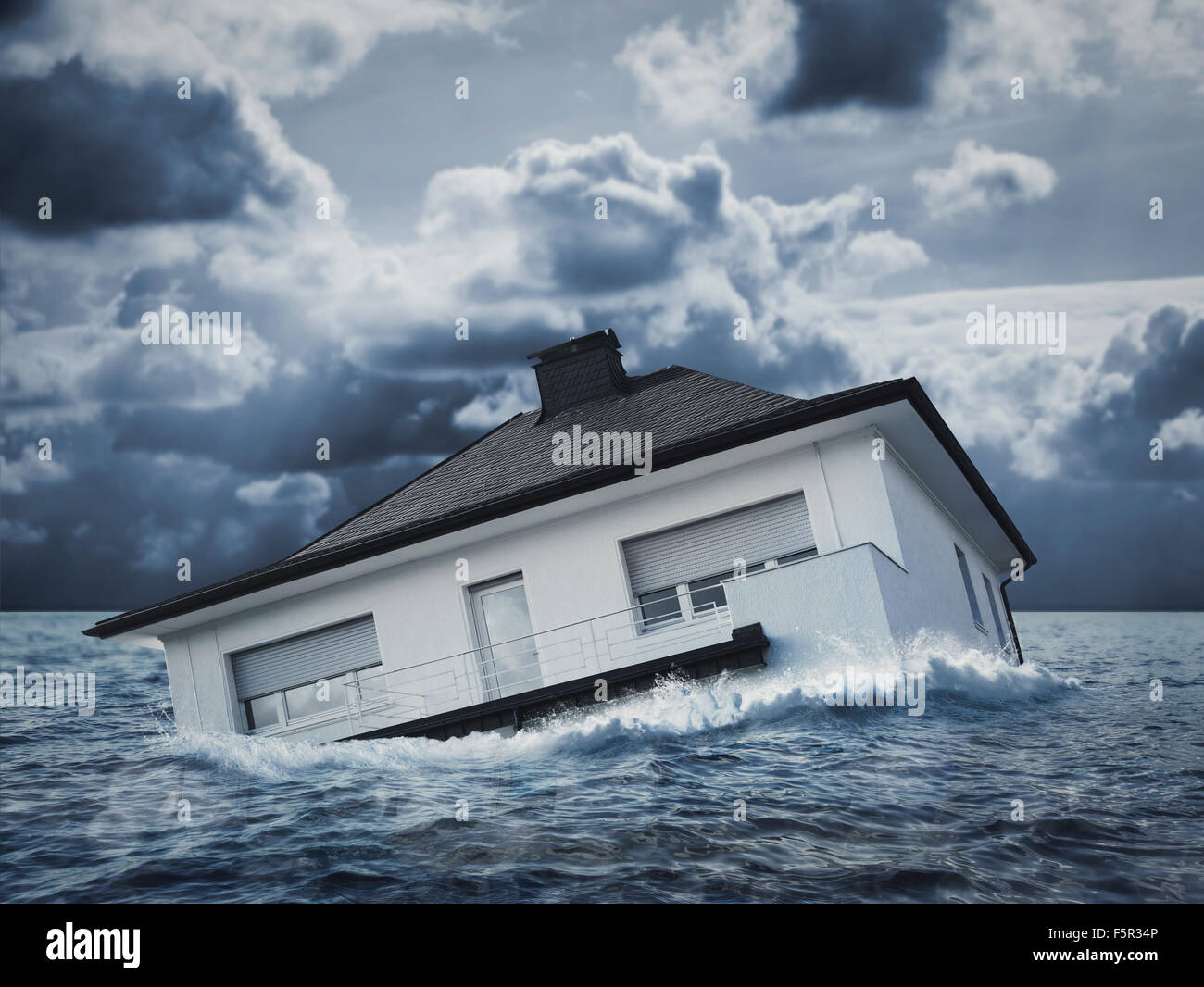 White house is sinking in floodwaters Stock Photo Alamy