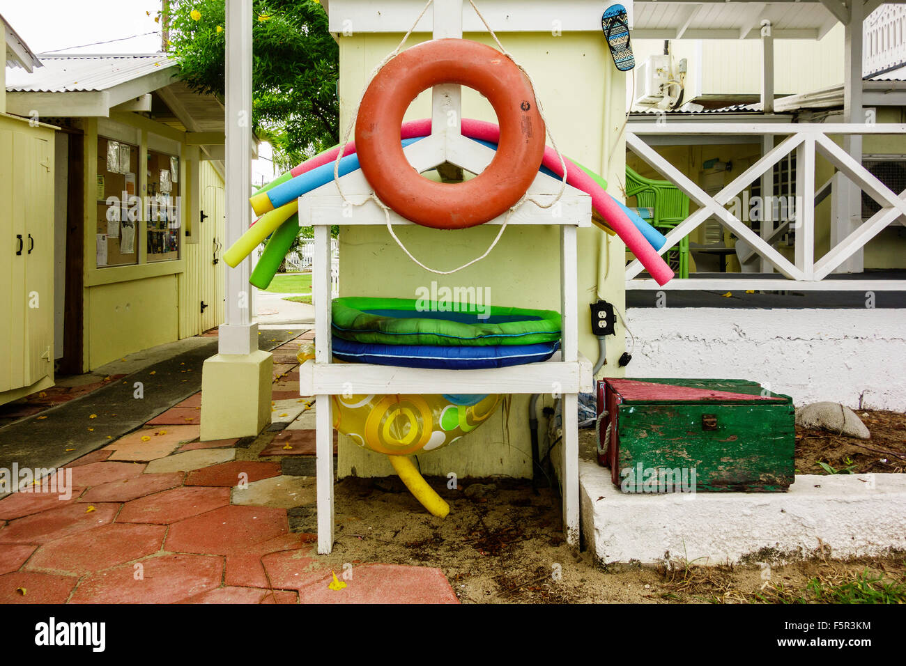 Water floats and toys piled up for vacationers' use at Cottages but the Sea resort in St. Croix, U.S. Virgin Islands. Stock Photo