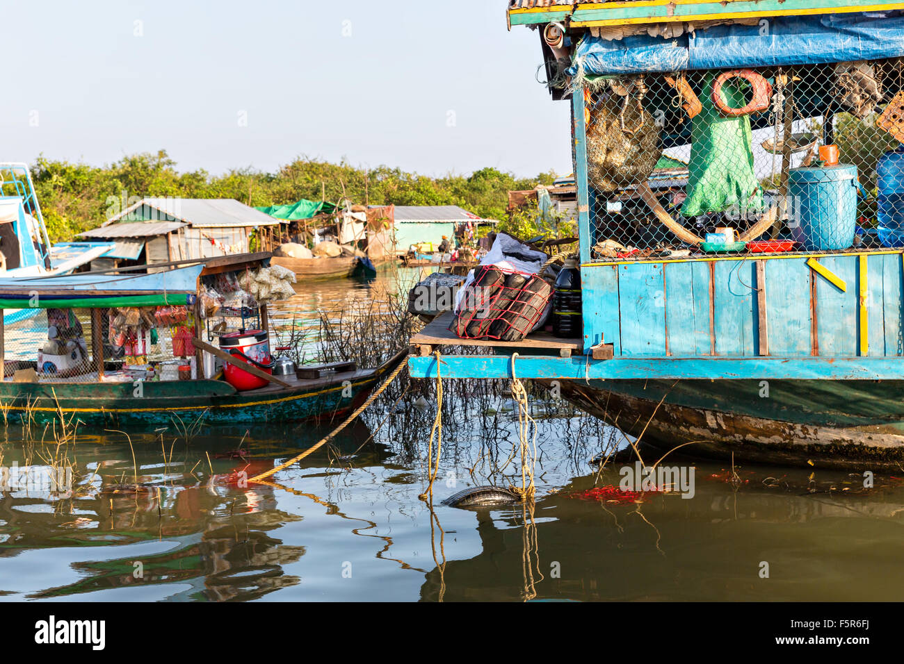 Boats on Tonlesap. Slums in Cambodia near laker Stock Photo