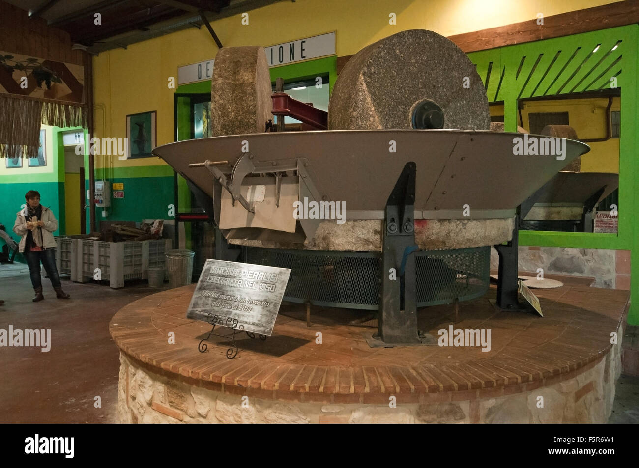 Old olive press on display, olive oil museum, Frantoio Bartolomei, Montecchio, Terni, Umbria, Italy Stock Photo