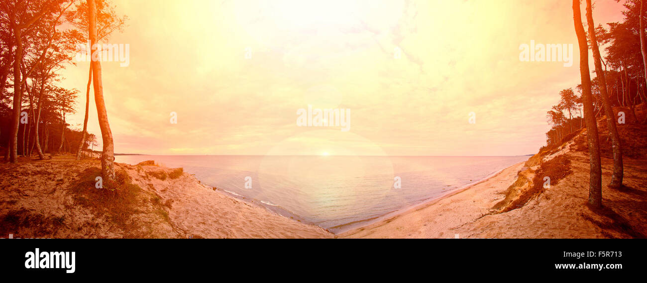 Beautiful red sunset over sea. Nature and shore Stock Photo - Alamy
