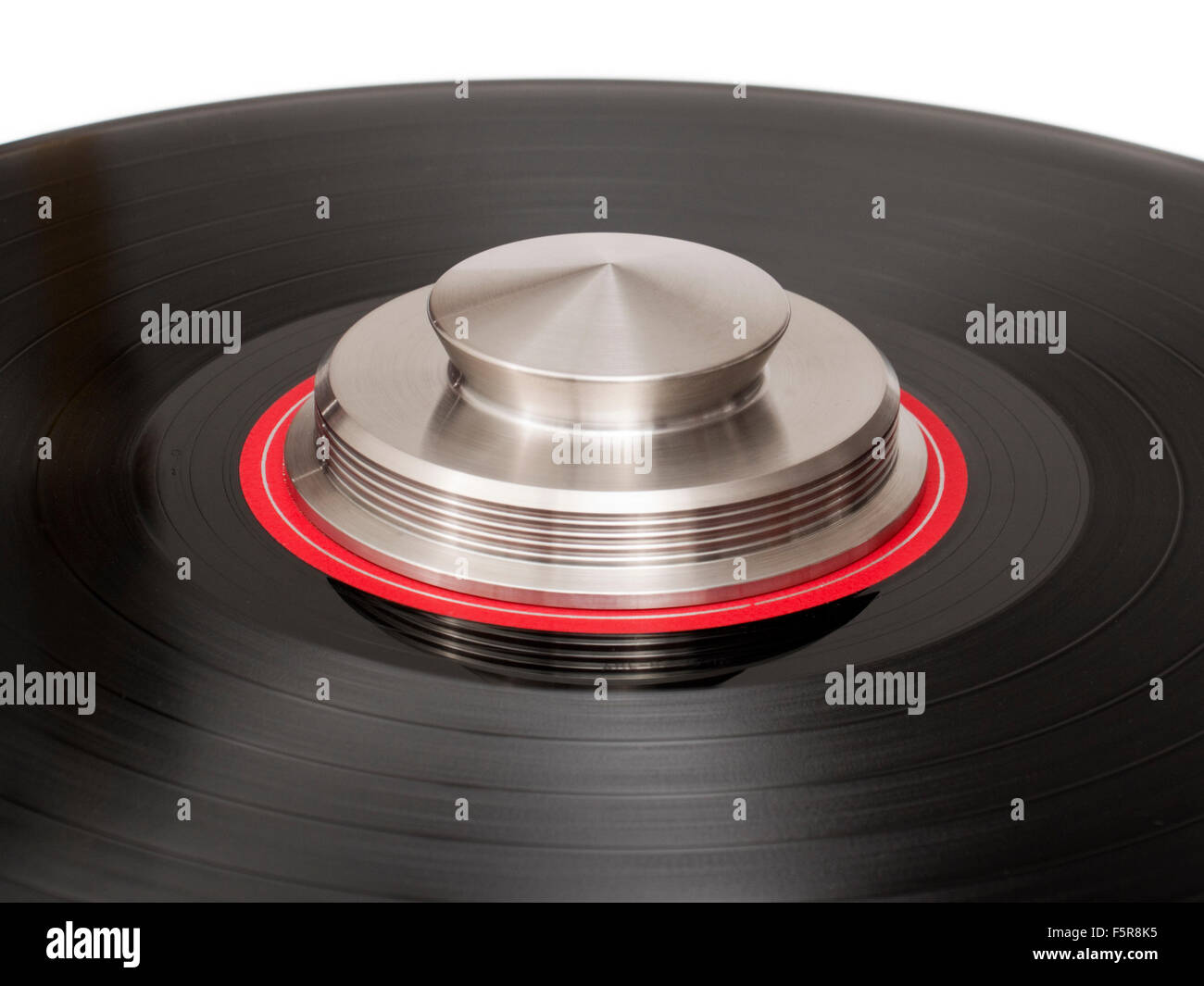 Stainless steel clamp / weight for stabilising vinyl records Stock Photo Alamy