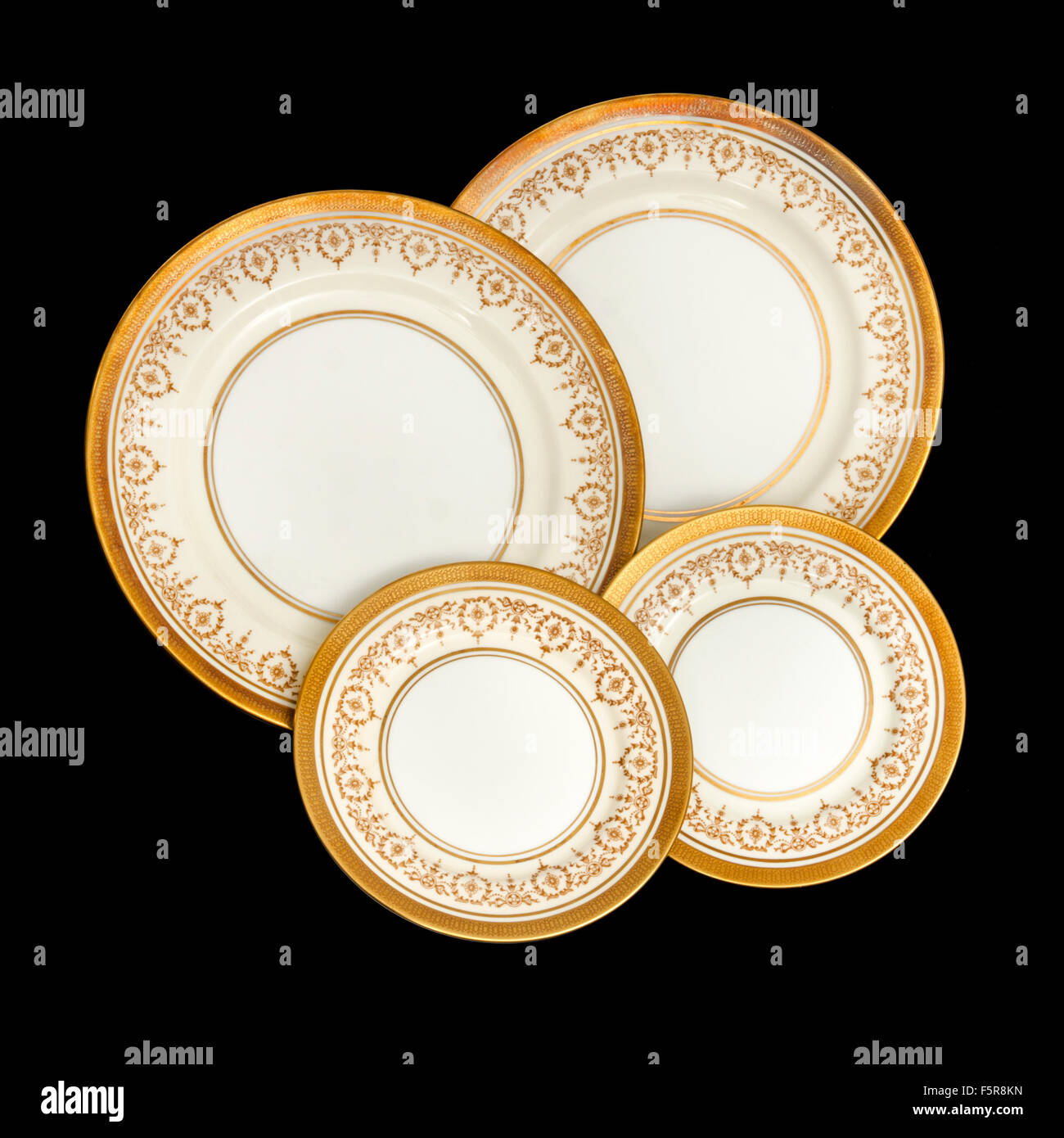 Selection of vintage 'Gold Dowery' dinner plates by Aynsley Pottery, Longton, England Stock Photo