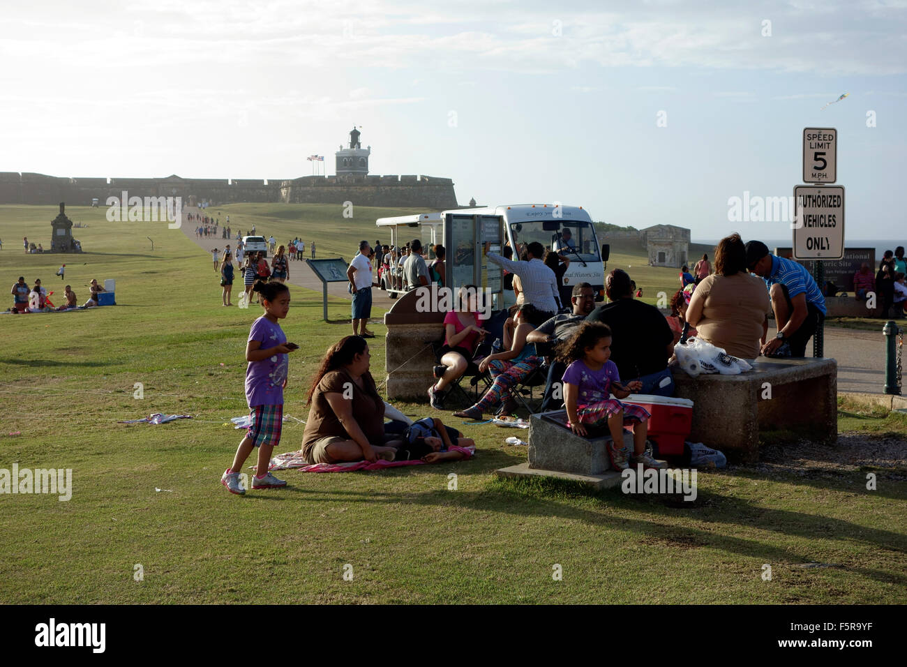 People picnicking at weekend near El Morro Fort, San Juan, Puerto Rico, Caribbean Stock Photo