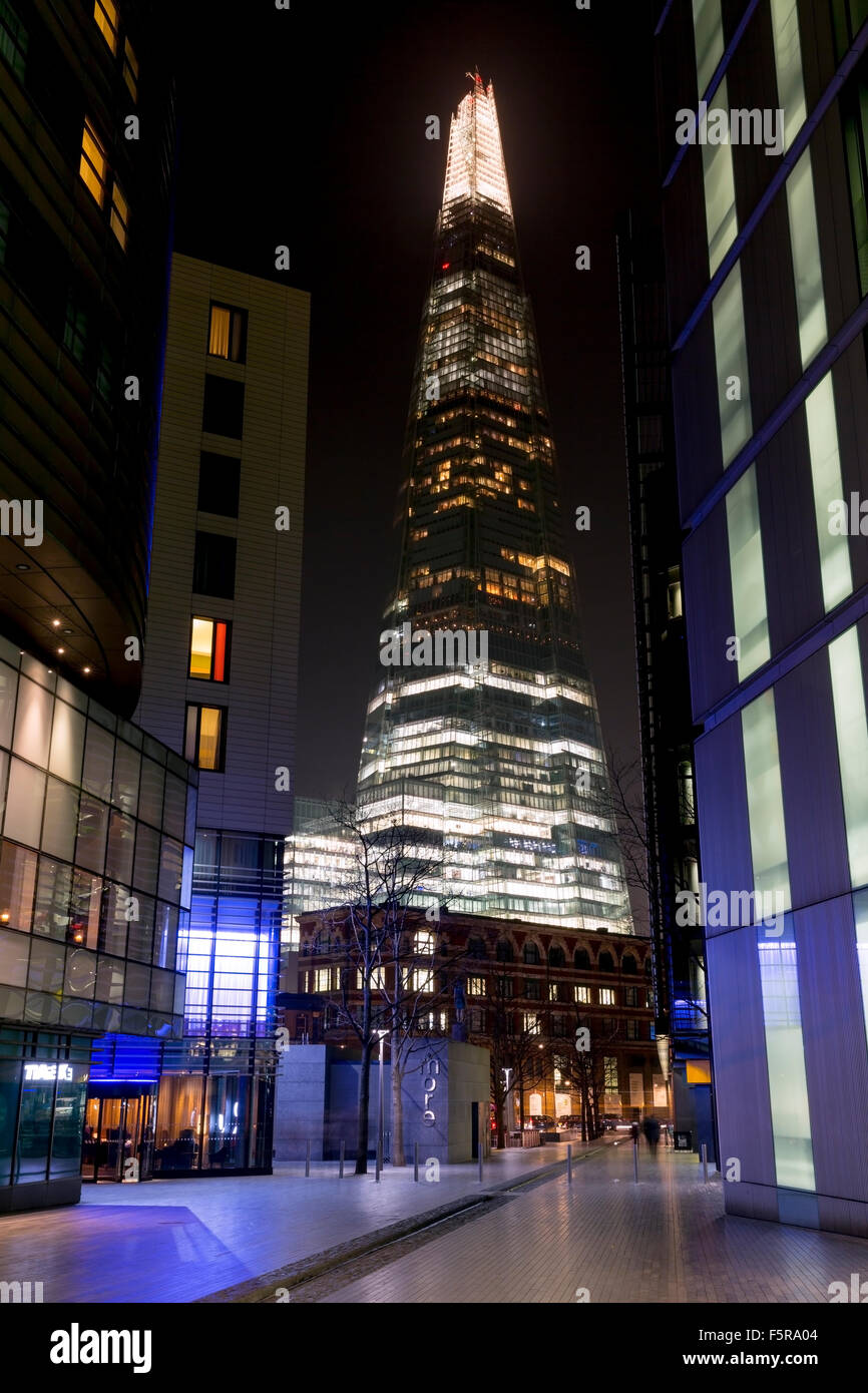 The Shard building pictured at Night from More London/Tooley Street, Standing 309m, the Shard is the tallest building in Europe. Stock Photo