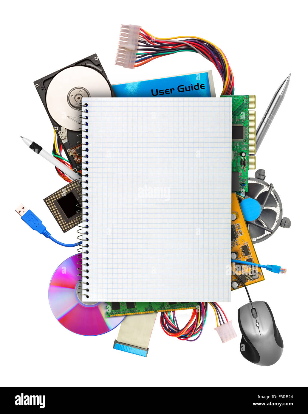 Computer hardware with blank notebook on top. Isolated on white Stock Photo
