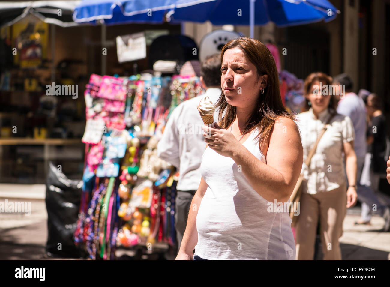 Woman eating ice cream, Paseo Ahumada, Santiago, Chile Stock Photo