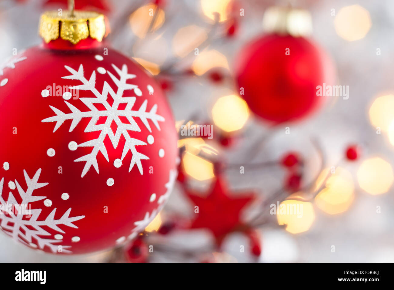 Red ball with snowflake hanging on tree Stock Photo - Alamy