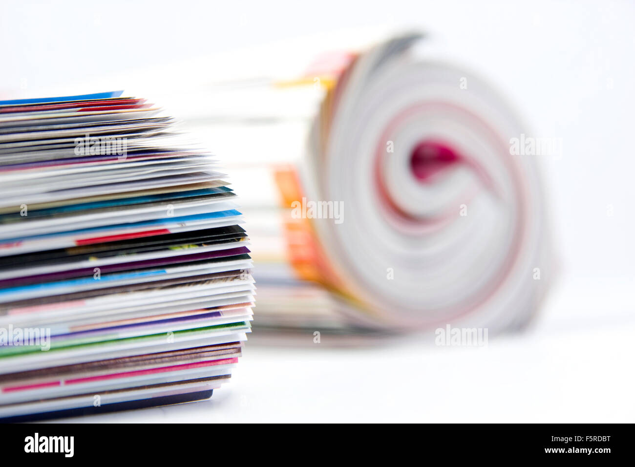 Magazine Roled Rolled up magazines Stock Photo - Alamy