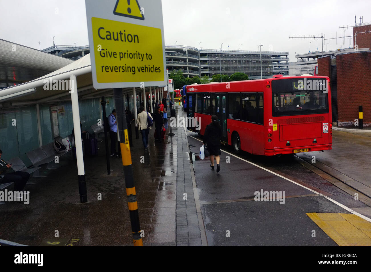 A bus waits for passengers at the bus ramps near Heathrow Airport in ...