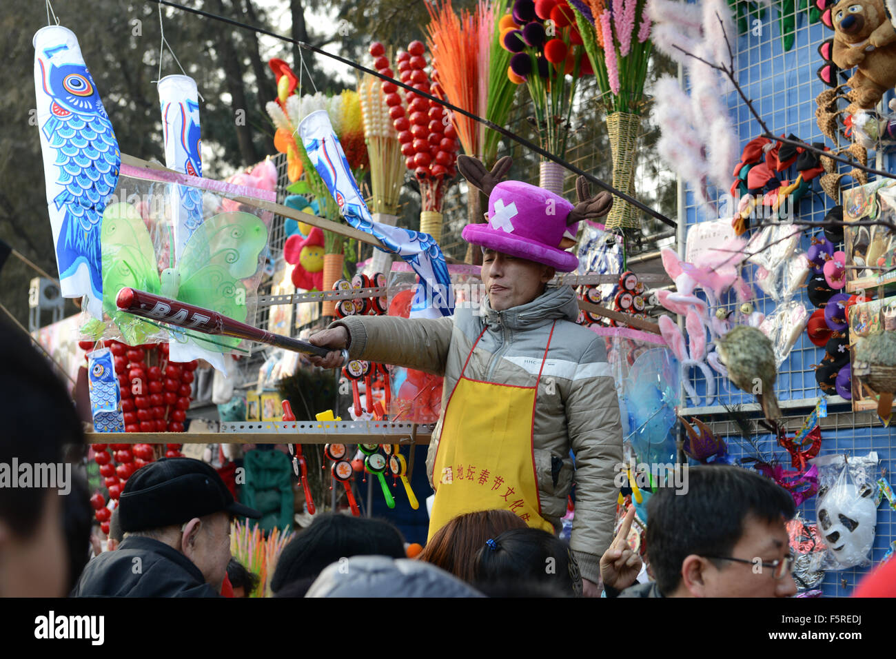 seller wears the Cartoon costume to sell at Ditan temple Fair Chinese New Year spring festival Stock Photo