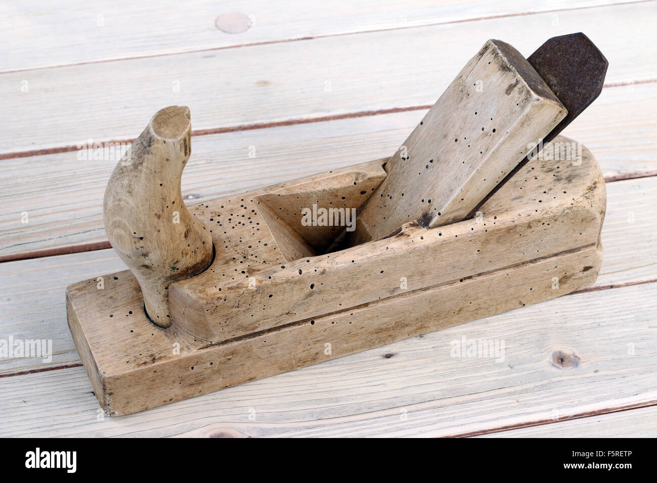 Hand tool - old and used plane Stock Photo