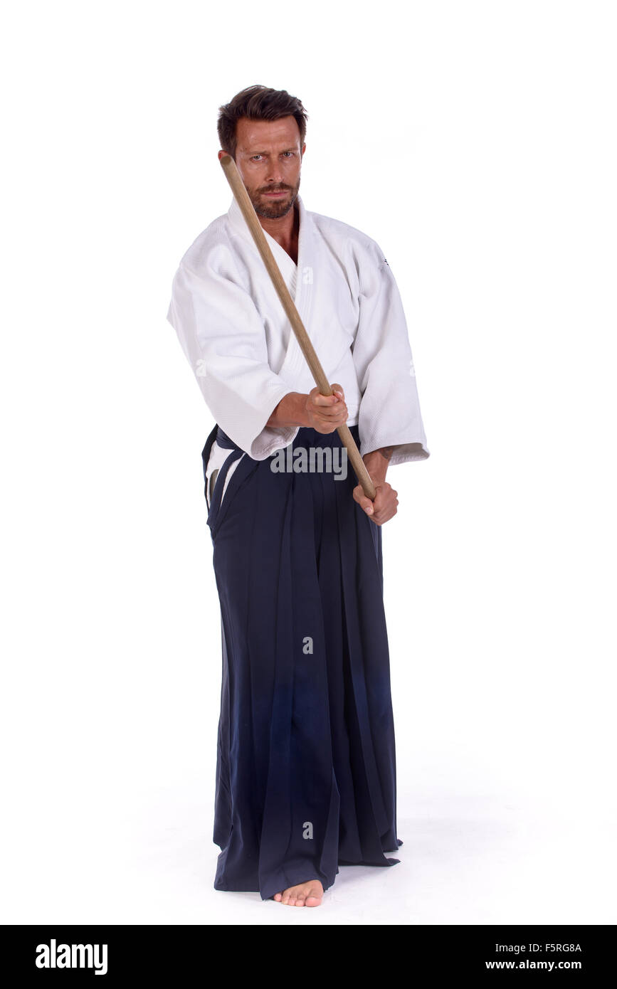 aikido master with sword in attack position Stock Photo Alamy