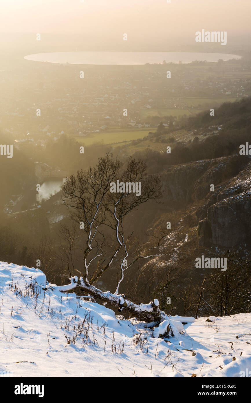 A winters day at a snow covered Cheddar Gorge in Somerset, UK, looking down towards the Cheddar reservoir. Stock Photo