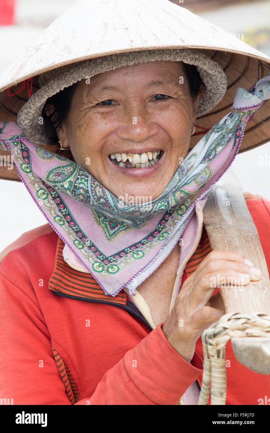 Portrait of a Vietnamese lady fruit seller in Hoi An, central vietnam,Asia Stock Photo