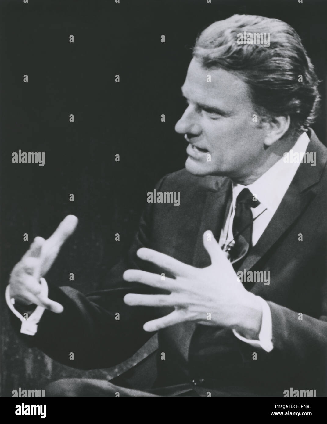 Billy Graham, international Christian evangelist, speaking on ABC-TV's 'Issues and Answers' program on August 24, 1969 where Graham addressed various topics including information he had received from personal sources that several militant revolutionary groups were planning terrorist activity in the United States in the fall of that year. Stock Photo