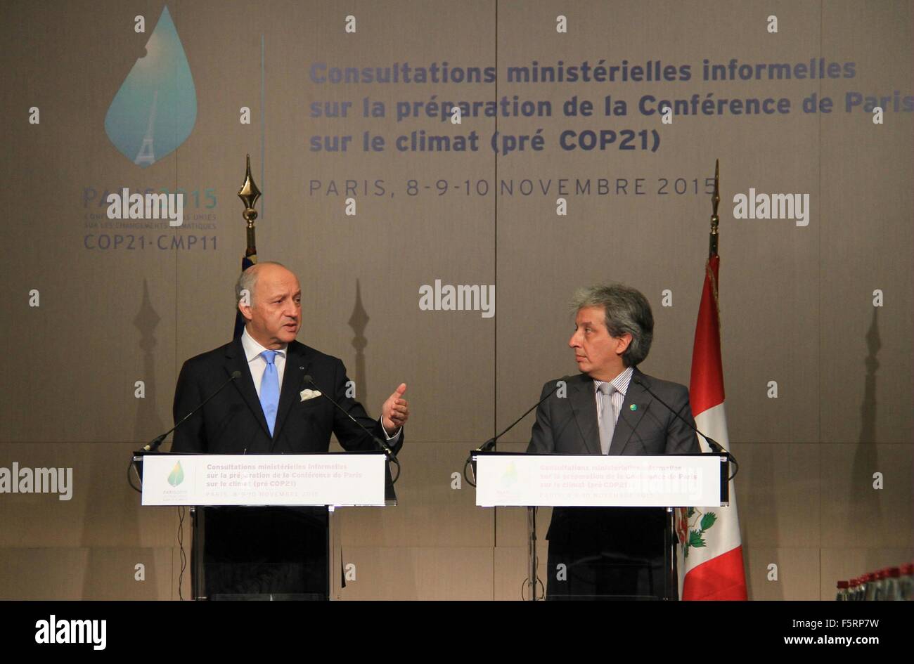 Paris, France. 8th Nov, 2015. French Foreign Minister and COP 21 President Laurent Fabius (L) addresses a meeting of foreign and environment ministers to prepare the way for the climate conference's final negotiations, in Paris, France, Nov. 8, 2015. France will host the climate conference in Paris (COP21) in December where officials aim to find a global and binding agreement to limit global warming to two degrees Celsius. © Zhang Xuefei/Xinhua/Alamy Live News Stock Photo