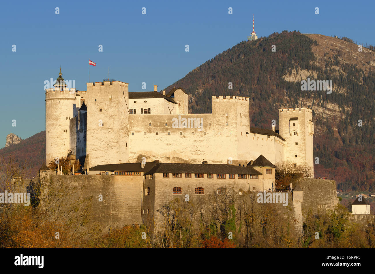 Salzburg fortress Hohensalzburg in Austria. Castle in front of Gaisberg mountain on the right and the Nockstein on the left. Stock Photo