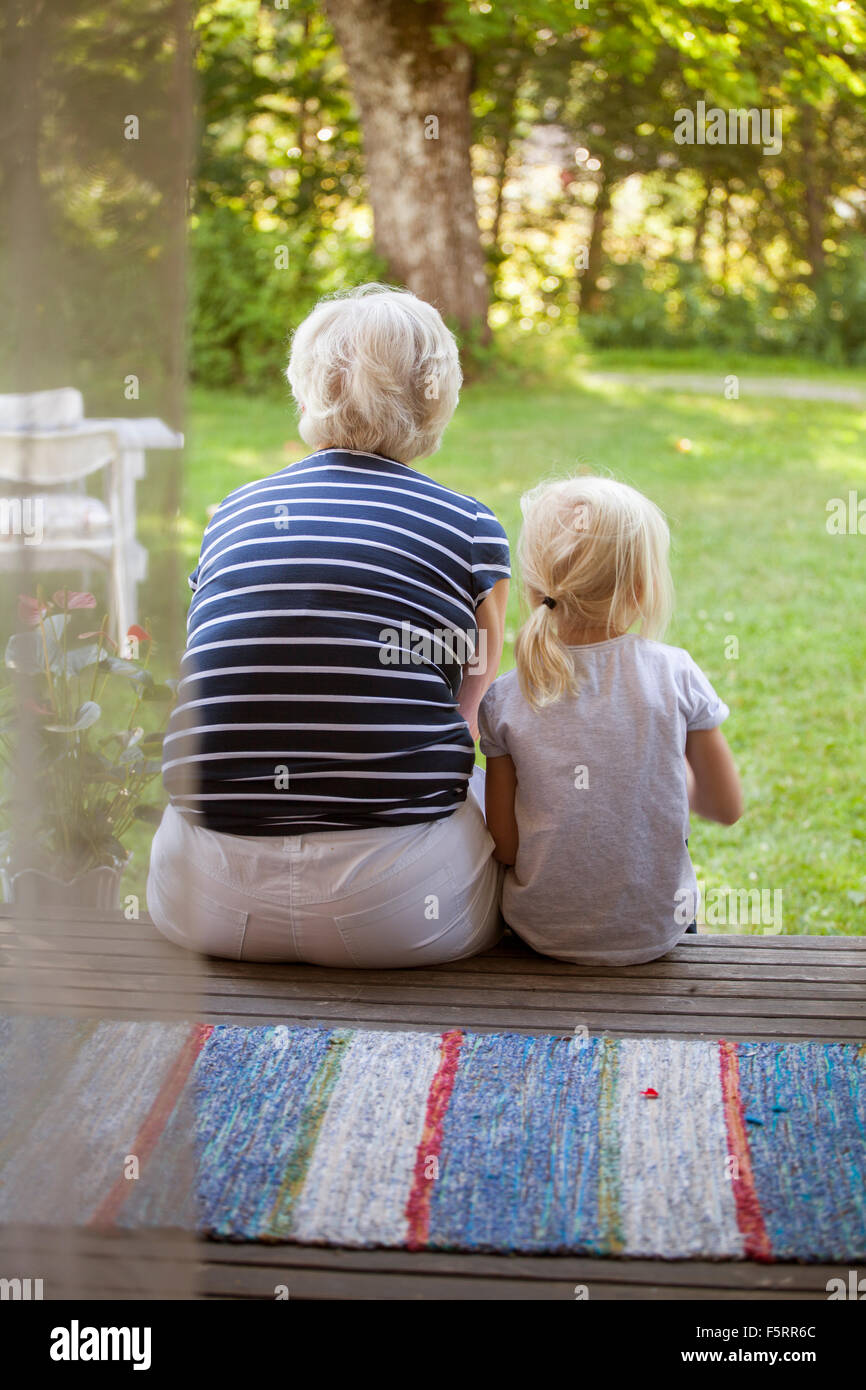 Girl sitting on porch hi-res stock photography and images - Alamy