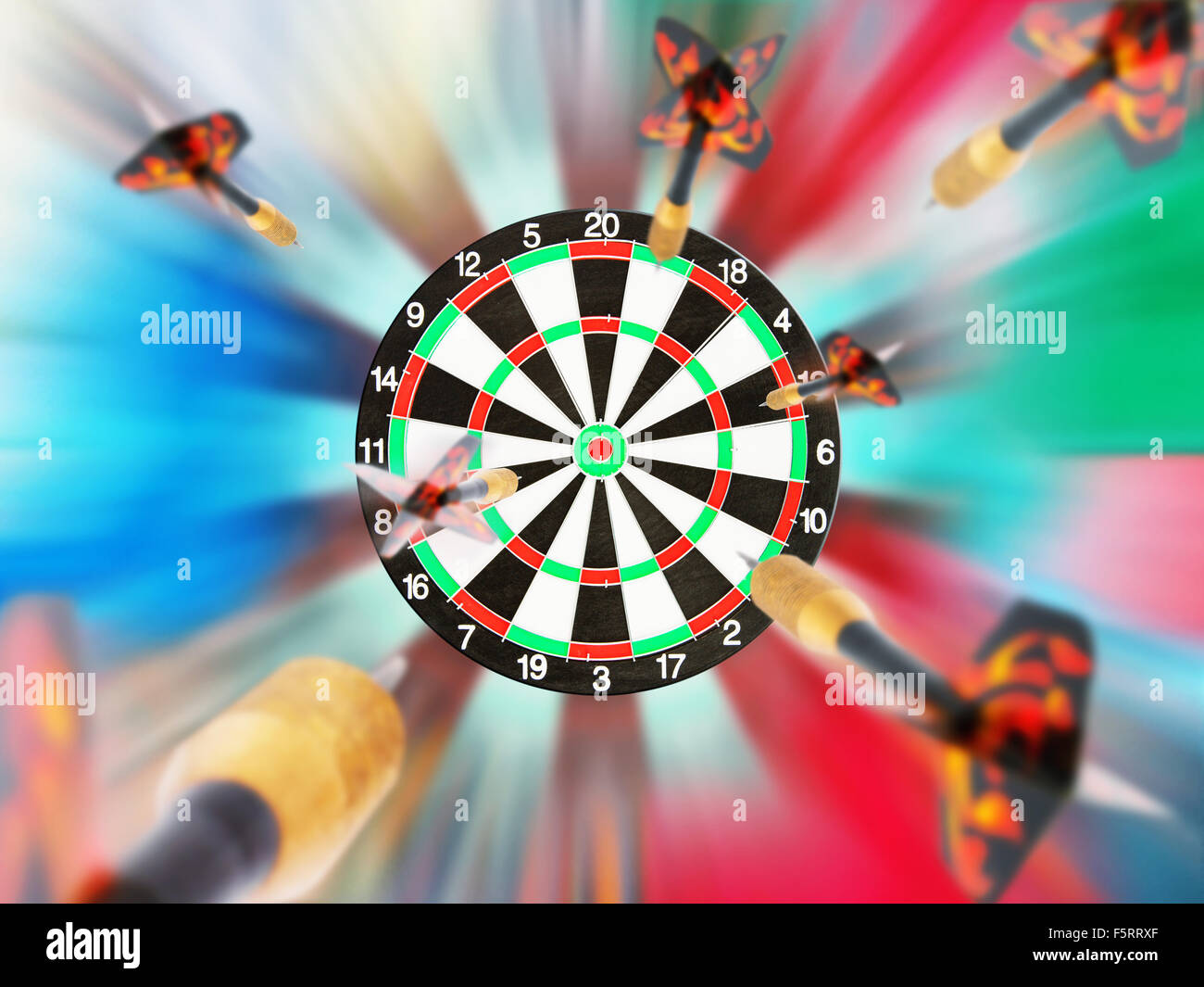 Classic Darts Board with flying darts Stock Photo Alamy
