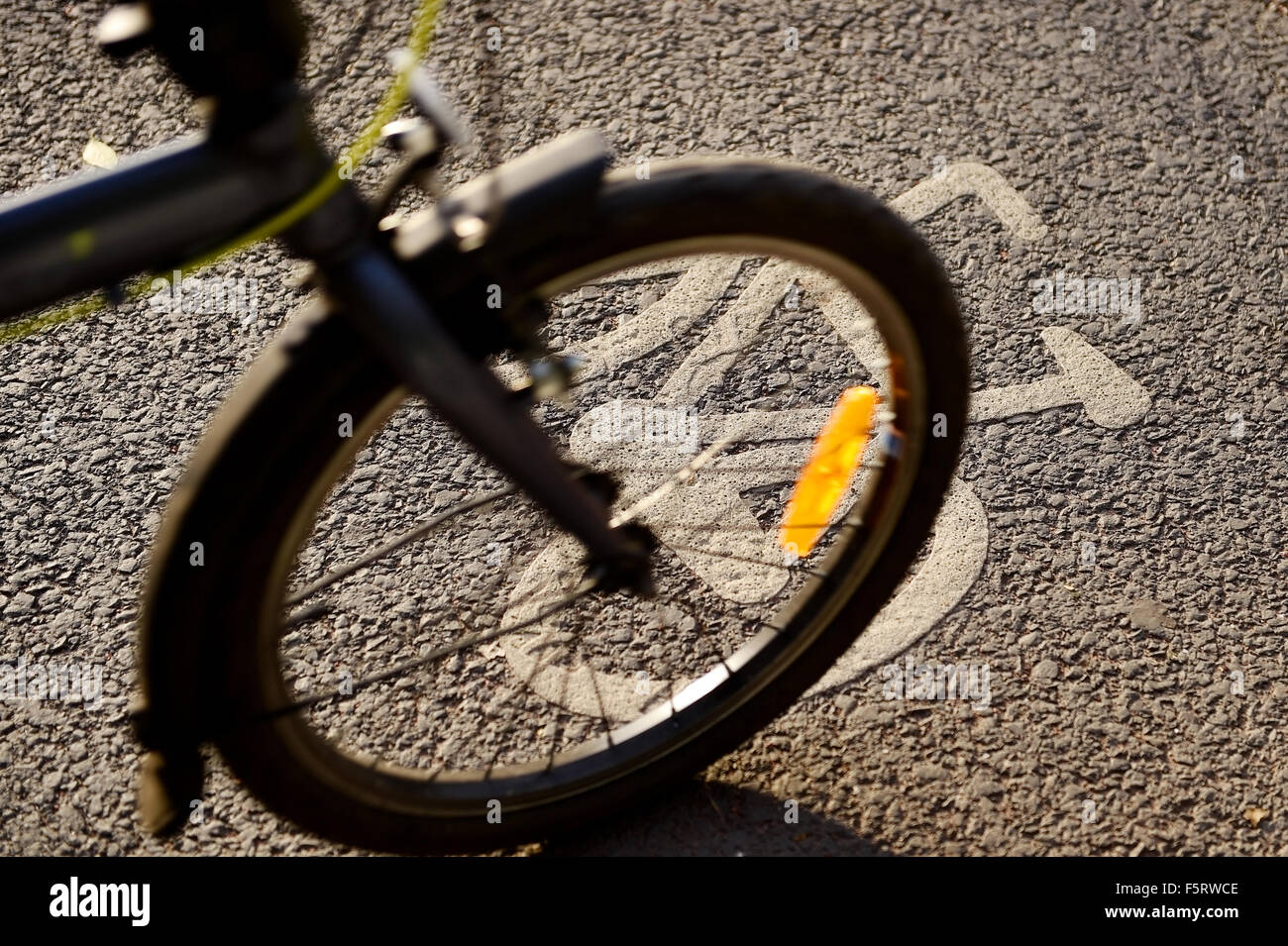 Bicycle passing by a transportation sign on a bicycle track Stock Photo