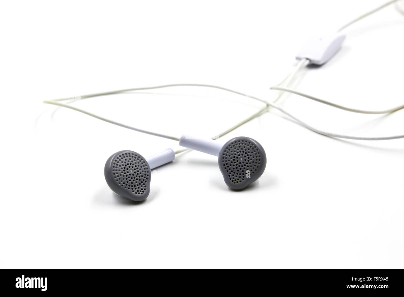 White earphones isolated on white background Stock Photo